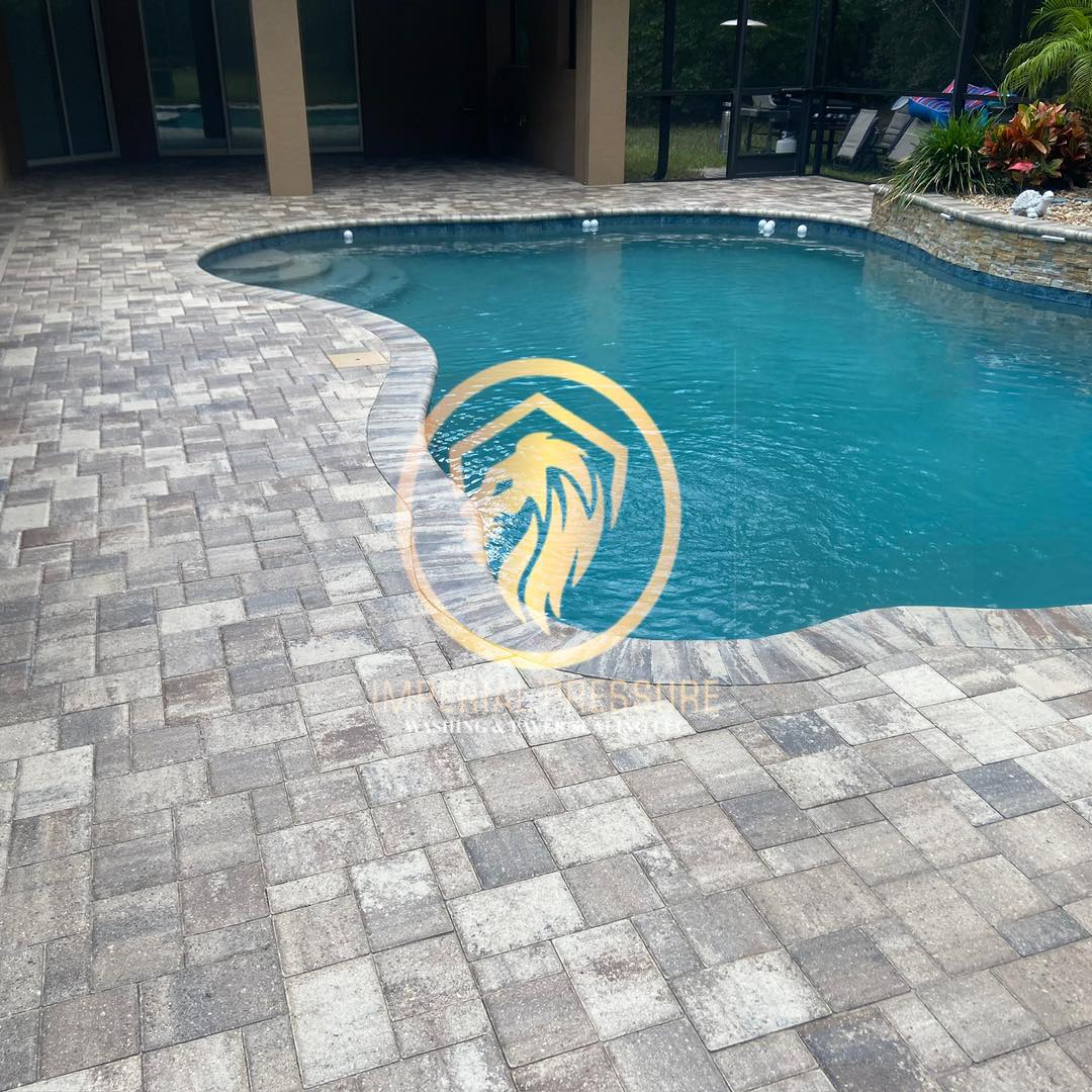 Beautiful pool deck, that has brick pavers, that were pressure washed, sanded and sealed. The color enhancement of the pavers are amazing